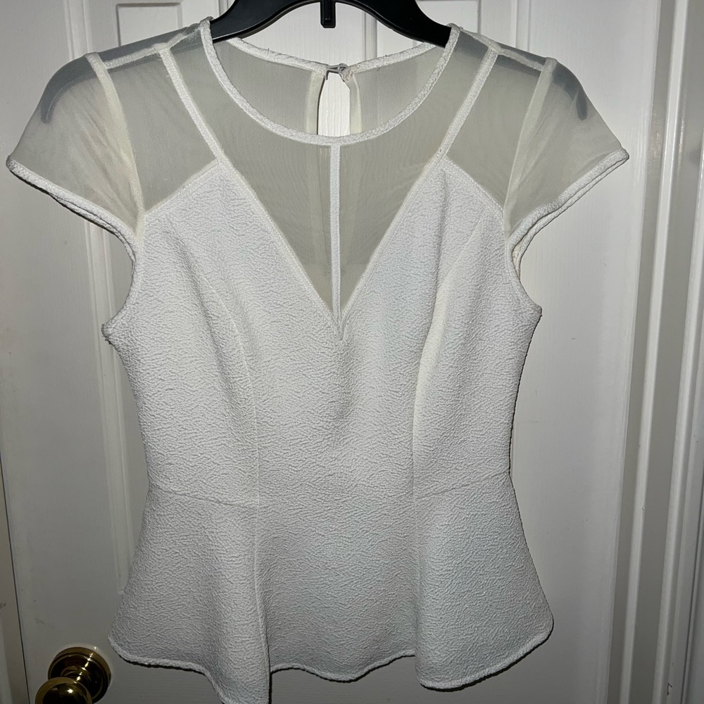 white peplum top from Guess.